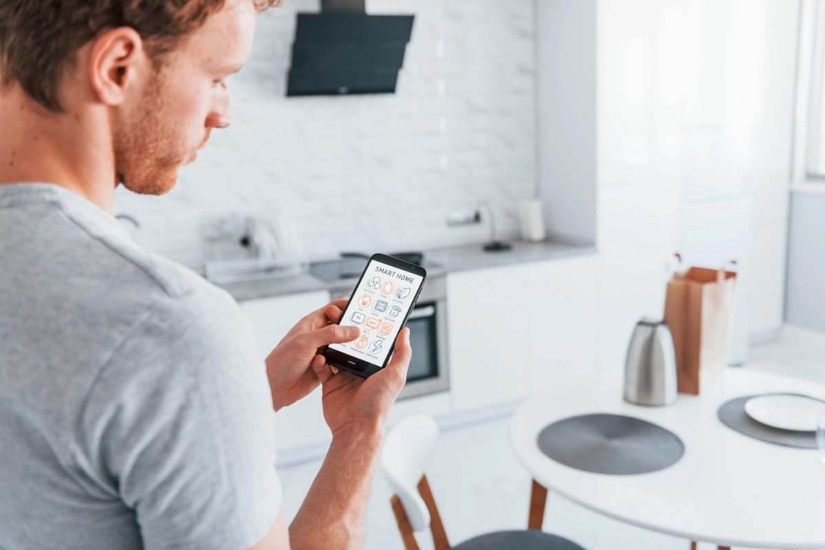 rear-view-of-adult-man-that-is-indoors-controlling-2023-11-27-05-12-41-utc